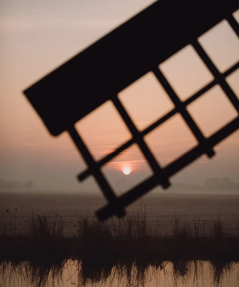 Zonsopgang over Waterland met molen bij Het Broeker Huis